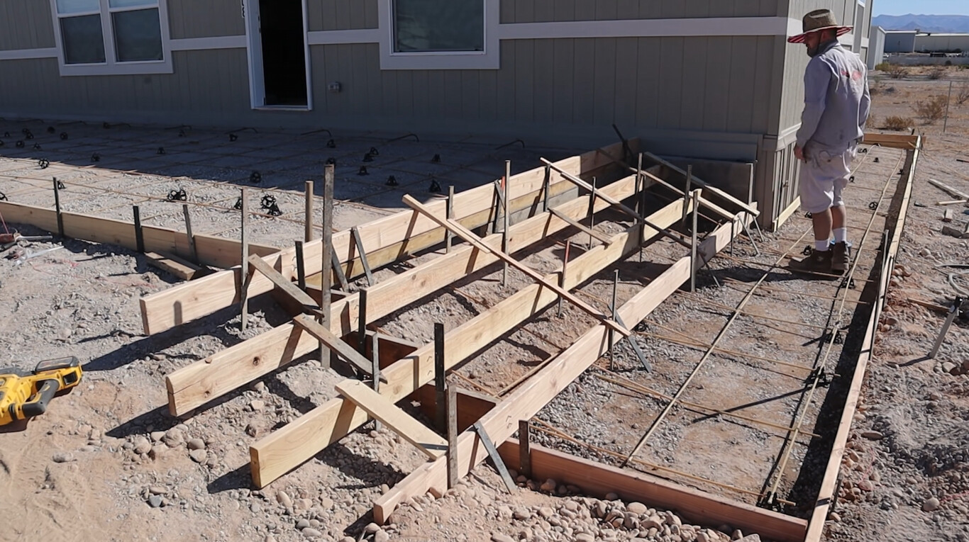 Professional concrete foundation preparation with proper grading in Carson, CA